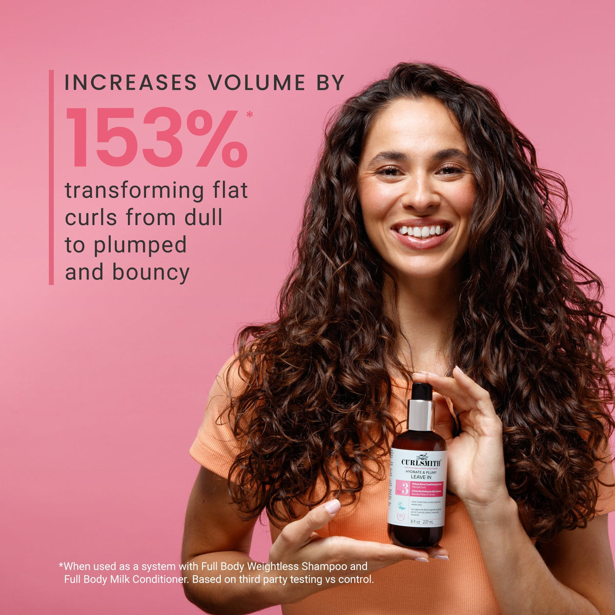 Woman holding a bottle of hair product with text on a pink background
