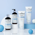 Curlsmithe hair care products on a light blue background