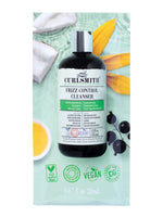 Curlsmith frizz control cleanser bottle on a green background with natural elements.