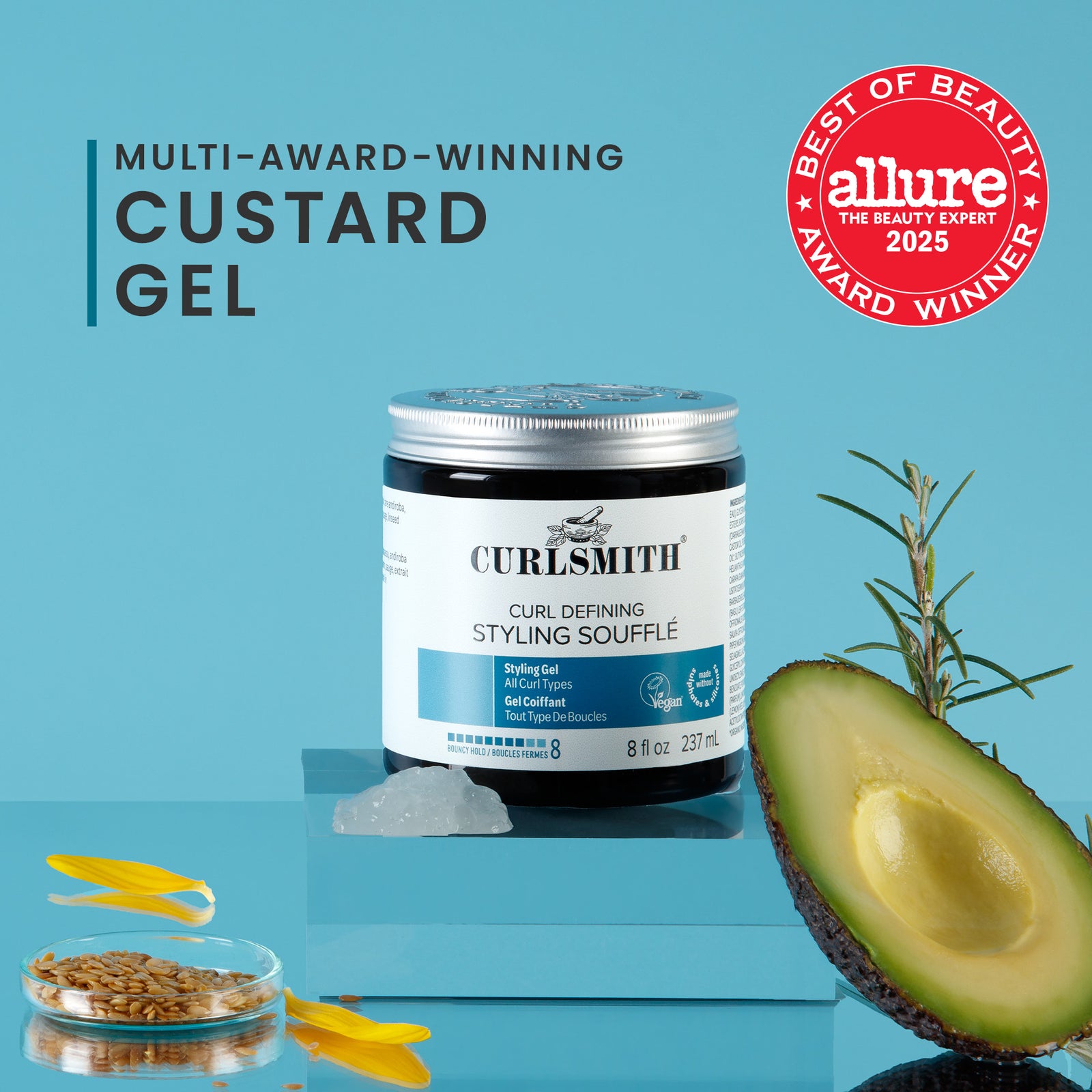 Curlsmith styling souffle jar with avocado and rosemary on a blue background, featuring Allure award.