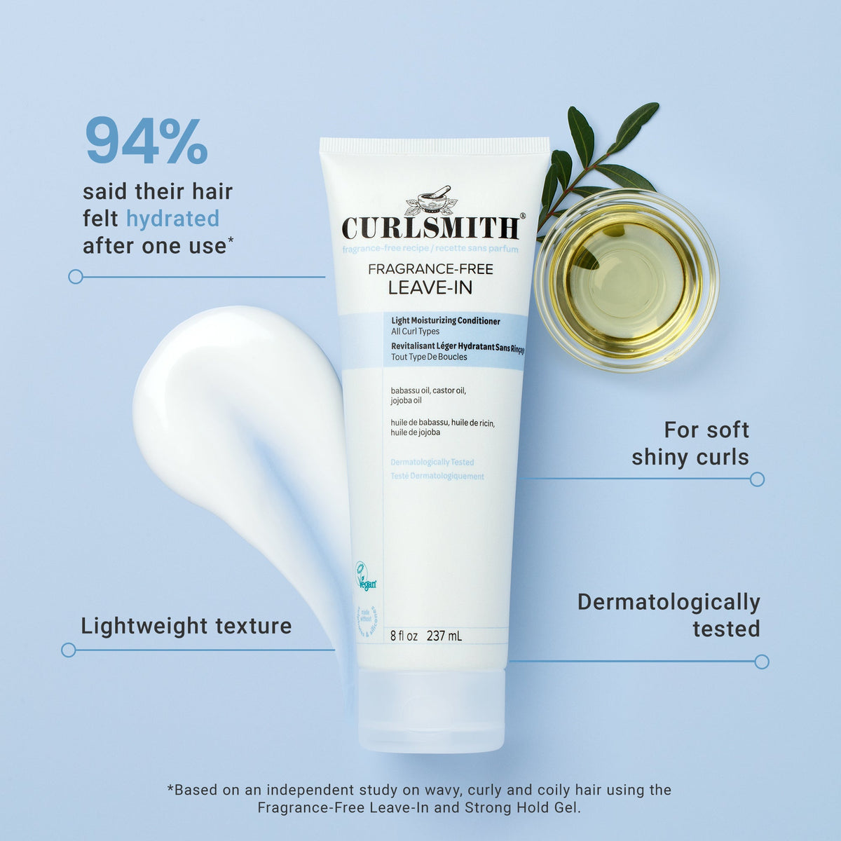 Curlsmith leave-in conditioner tube with olive oil and text on a blue background