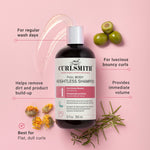 Curlsmith shampoo bottle with product features on a pink background